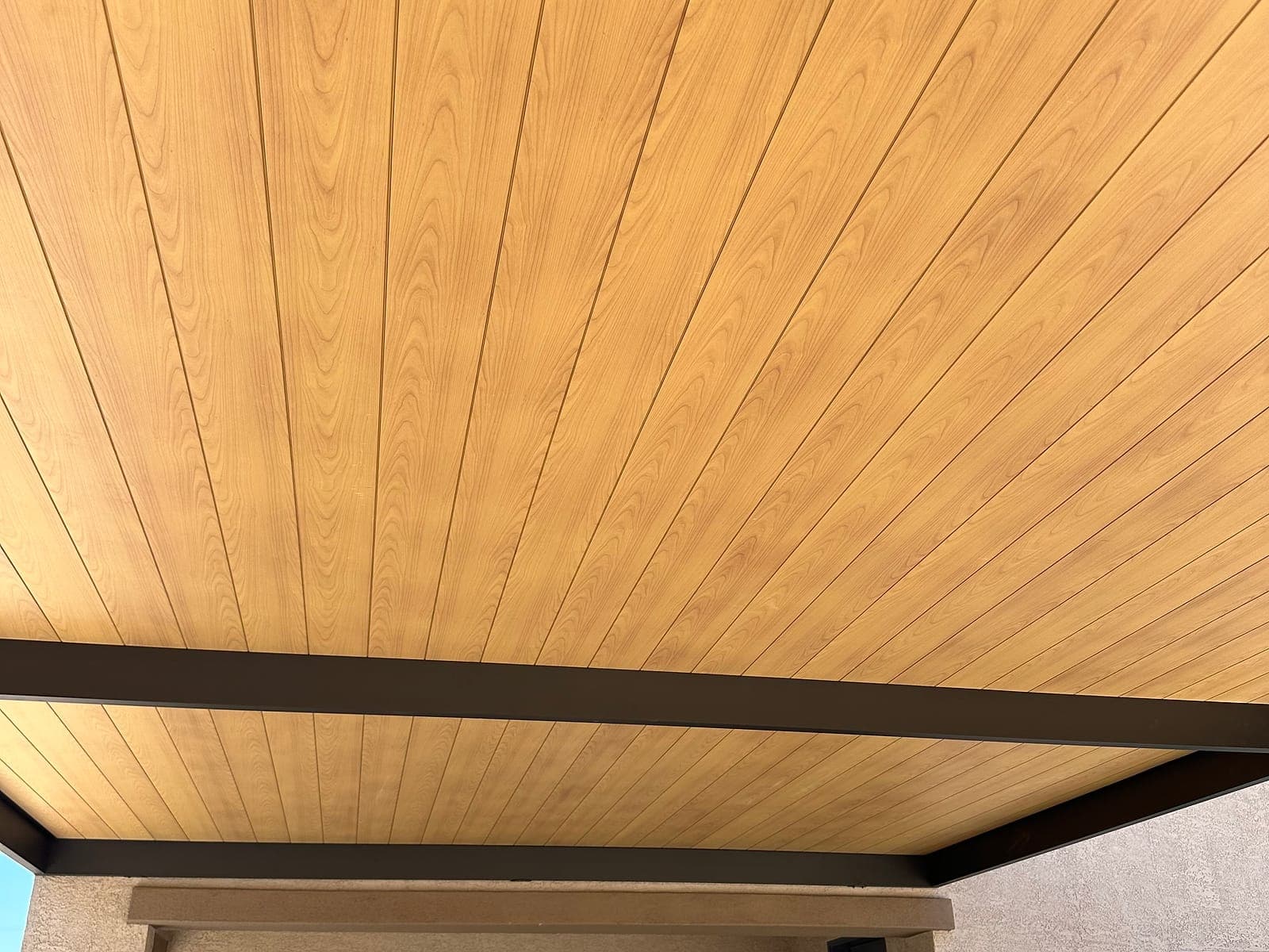 Close-up of the Sandalwood wood grain underside of a Twin Wall attached cover